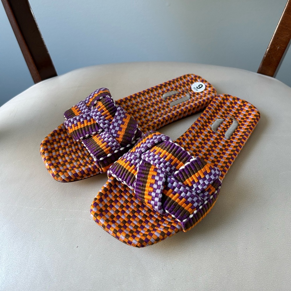 Amambaih orange and purple woven flat sandals